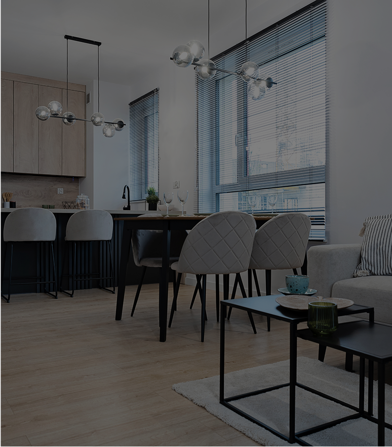 Modern living room and kitchen with seating.